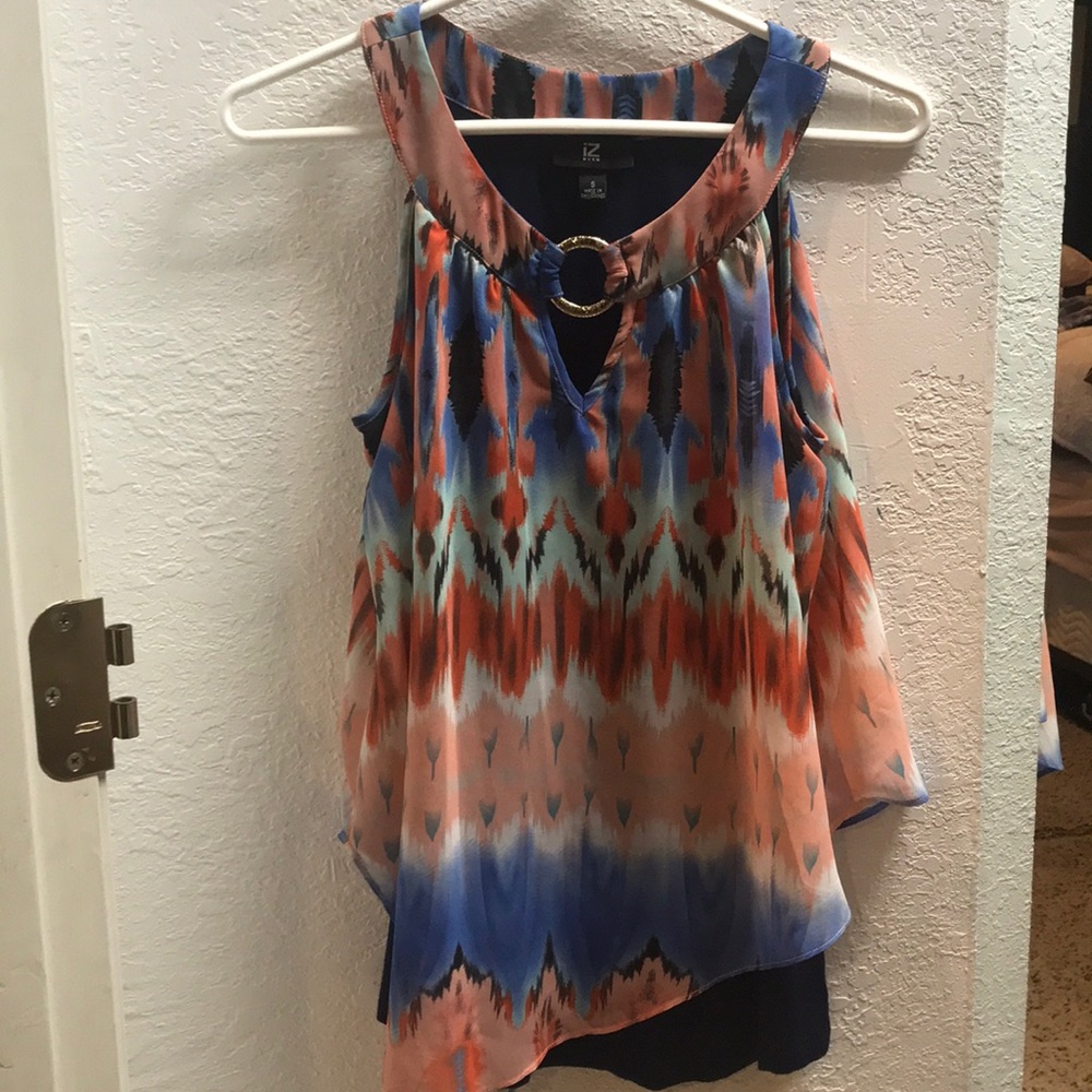 Small women’s sleeveless asymmetrical blouse